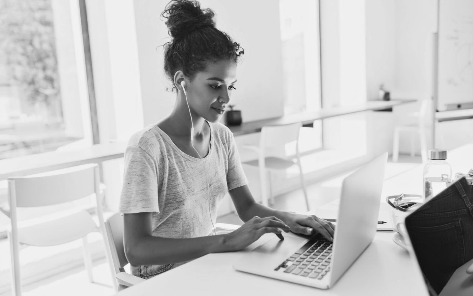 Financial team reviewing automated compliance reports on digital screens